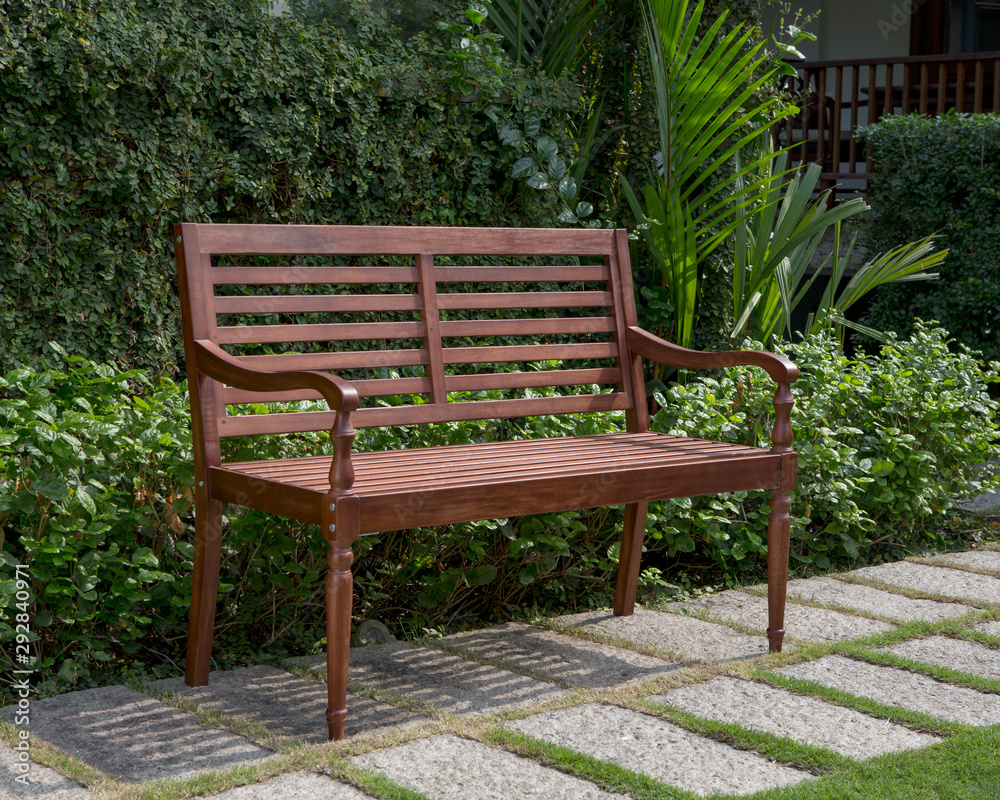 The wood bench in the garden.