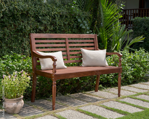 The wood bench in the garden.
