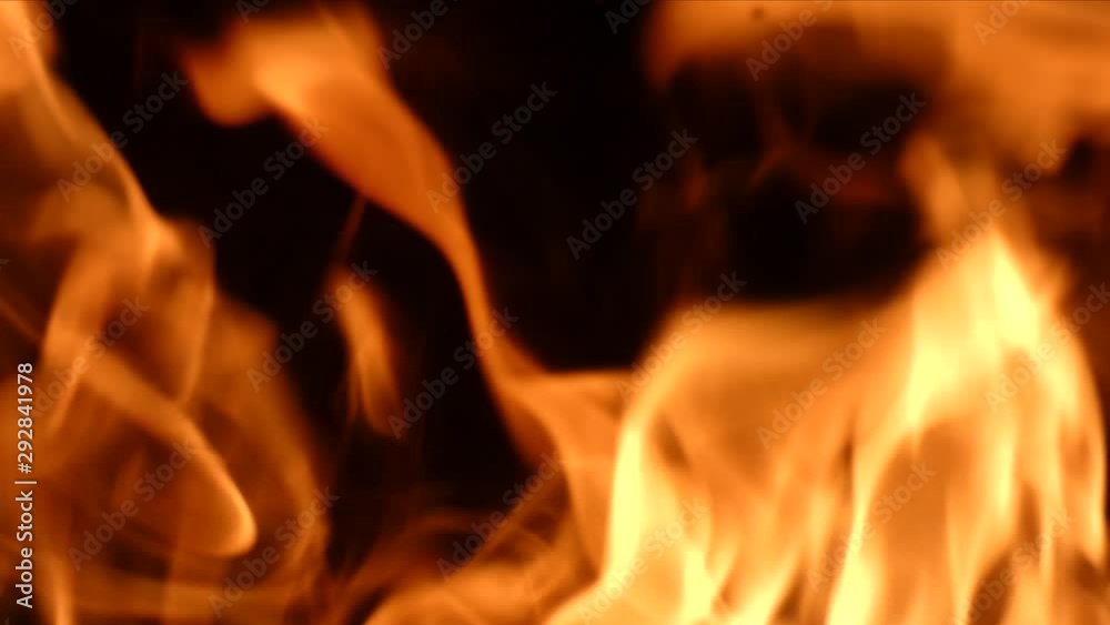 Pure bright flame - natural background. Orange fire burn, black surface at the back. With original sound. Pure bright flame - natural background. Orange fire burn, black surface at the back. With original sound.