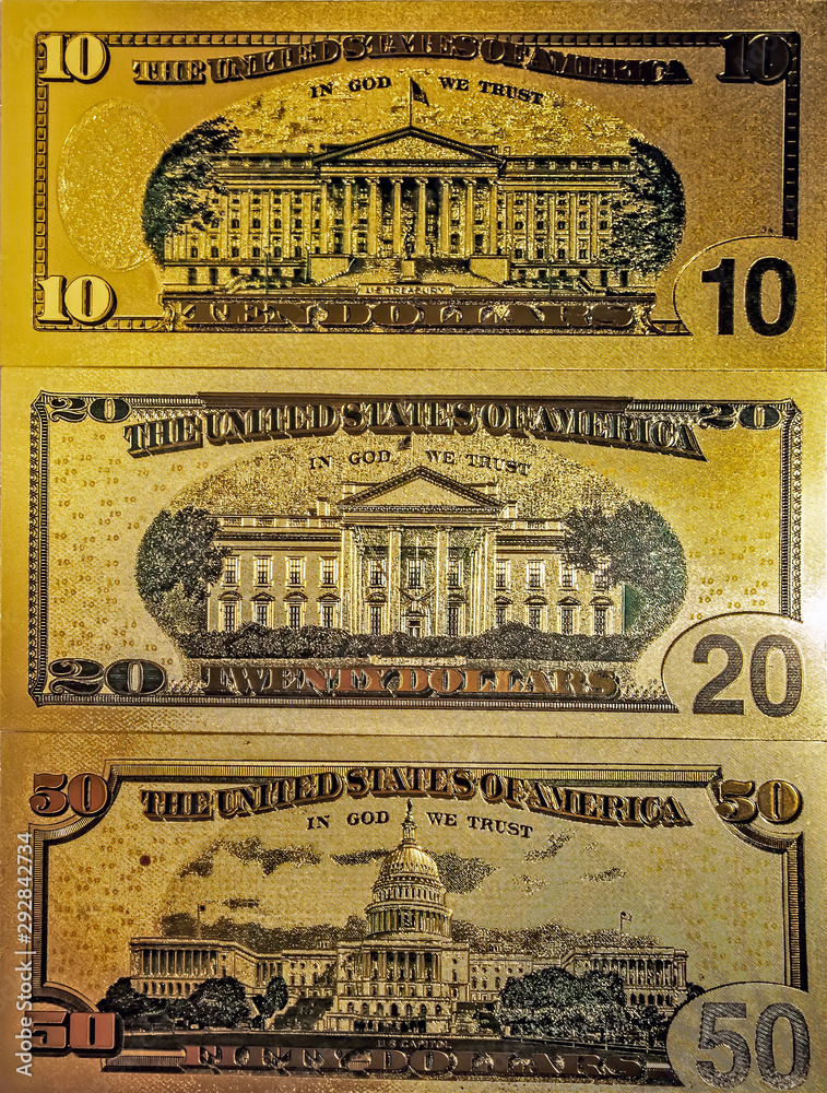 Souvenir American Gold Heap of Dollar Bills golden background.