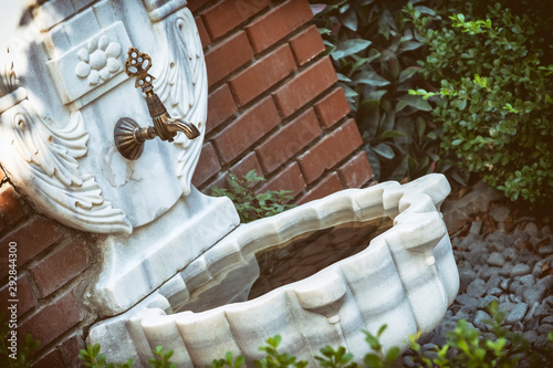 Ottoman Style Faucet And Basin From Sogukcesme Street, Istanbul, Turkey photo