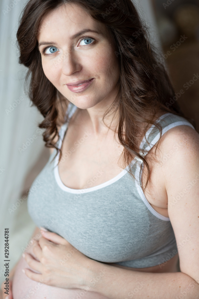 Fototapeta premium pregnant woman at home