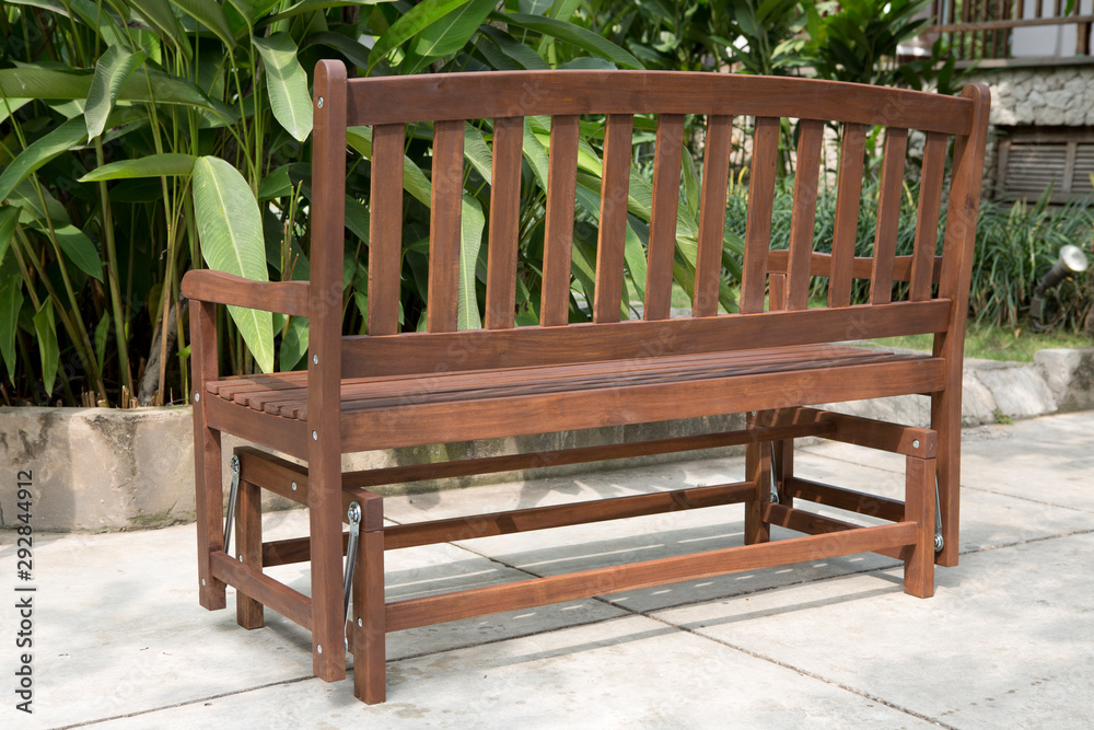 The wood bench in the backyard. The wood bench in the backyard.