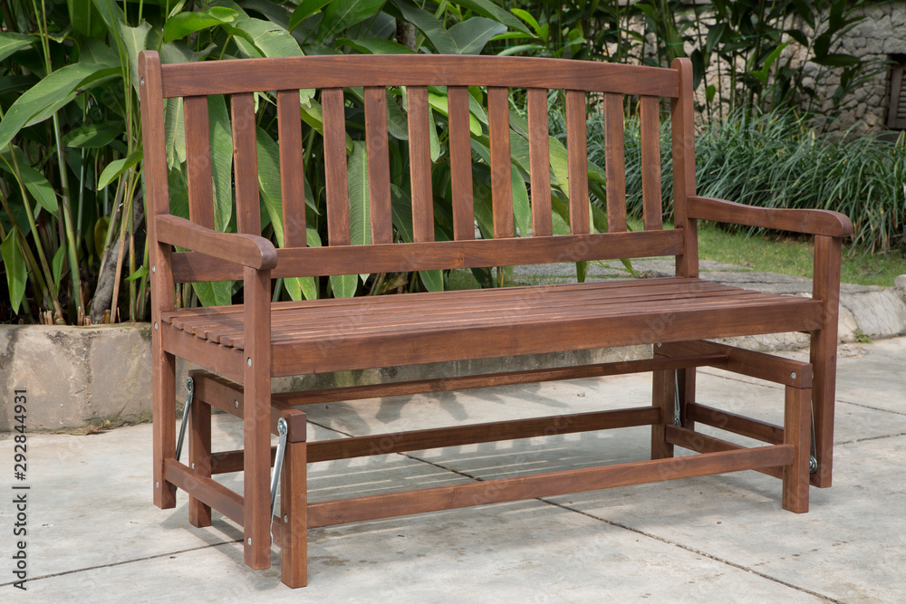 The wood bench in the backyard. The wood bench in the backyard.