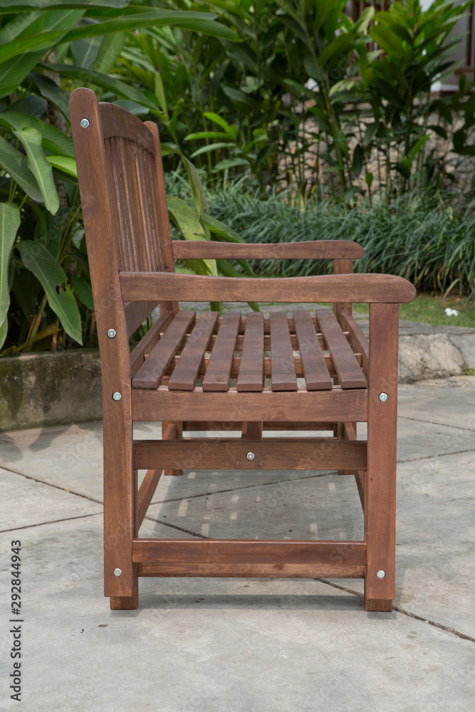 The wood bench in the backyard. The wood bench in the backyard.