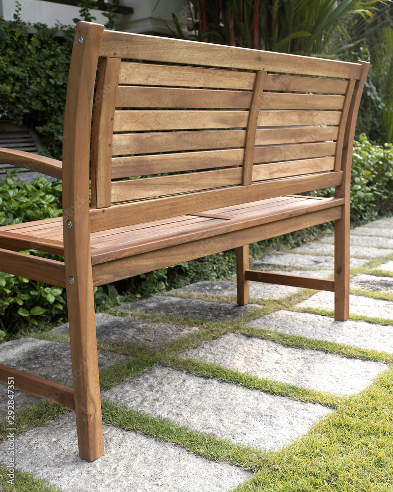 The detail of wood bench in the backyard. The detail of wood bench in the backyard.