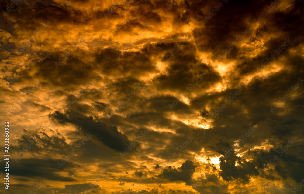 Dramatic golden sunset sky and white cumulus clouds. Cloudy sky. God light concept. Beautiful cloudscape. Peaceful and tranquil concept. Nature abstract background. Beauty in nature. Climate change. Dramatic golden sunset sky and white cumulus clouds. Cloudy sky. God light concept. Beautiful cloudscape. Peaceful and tranquil concept. Nature abstract background. Beauty in nature. Climate change.