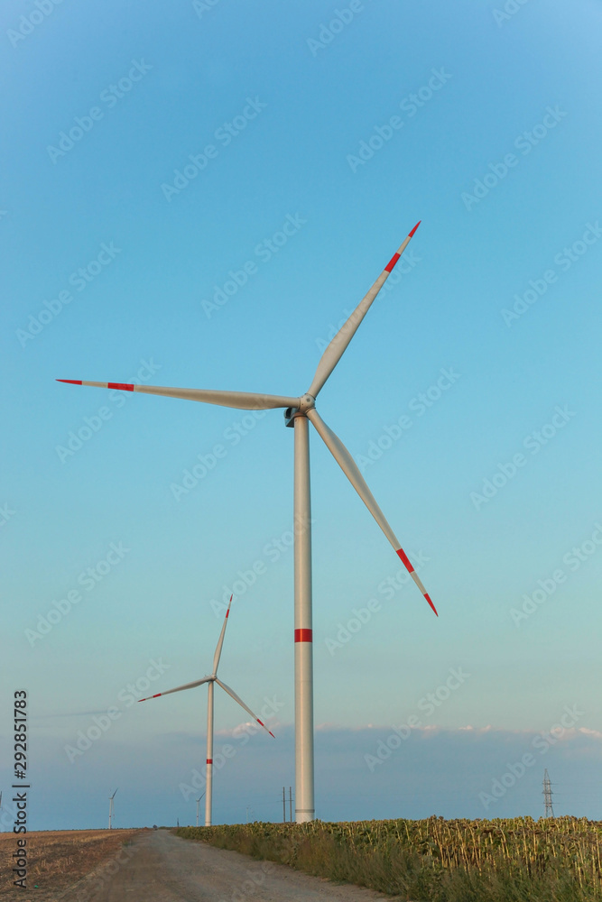 Wind mill farm in field Wind mill farm in field