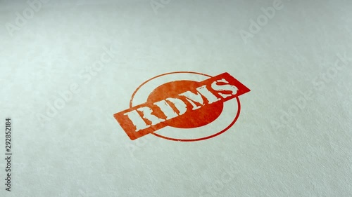 Rdms word stamping text wooden retro stamp animation. red ink on clean white paper photo