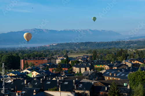 Air balloons on the sky at Llivia, catalonian town photo