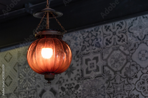 Vintage orange light lamps retro design of ceiling hanging light bulb interior decoration © pomphotothailand