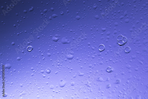 water drops on colored glass