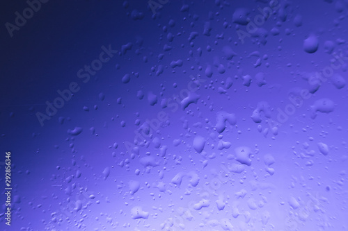 water drops on colored glass