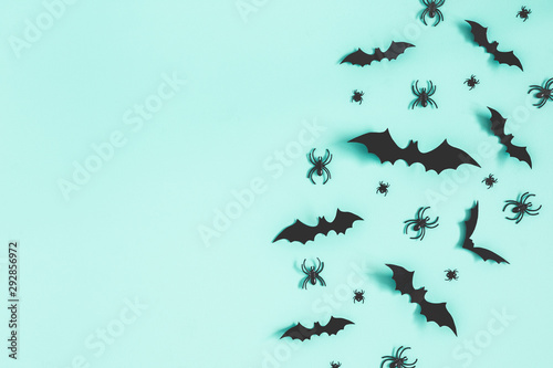 Halloween decorations on blue background. Halloween concept. Flat lay, top view, copy space © Flaffy