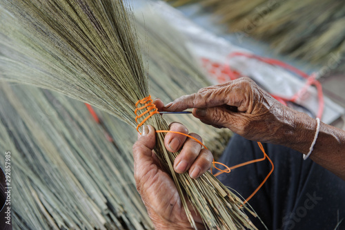 close up hand made brooms grass thailand broom photo