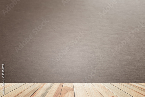 Empty Gray wooden floor perspective and empty dark loft cement wall room interiors background with soft light,well use editing display your product or text present on free space background vintage