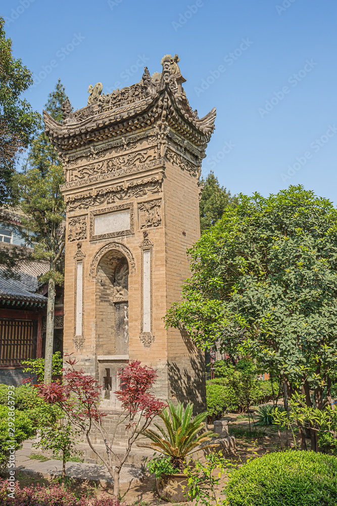 Fototapeta premium Rear view of a decorated ornamental gate in the garden of the Great Mosque in Xi'an