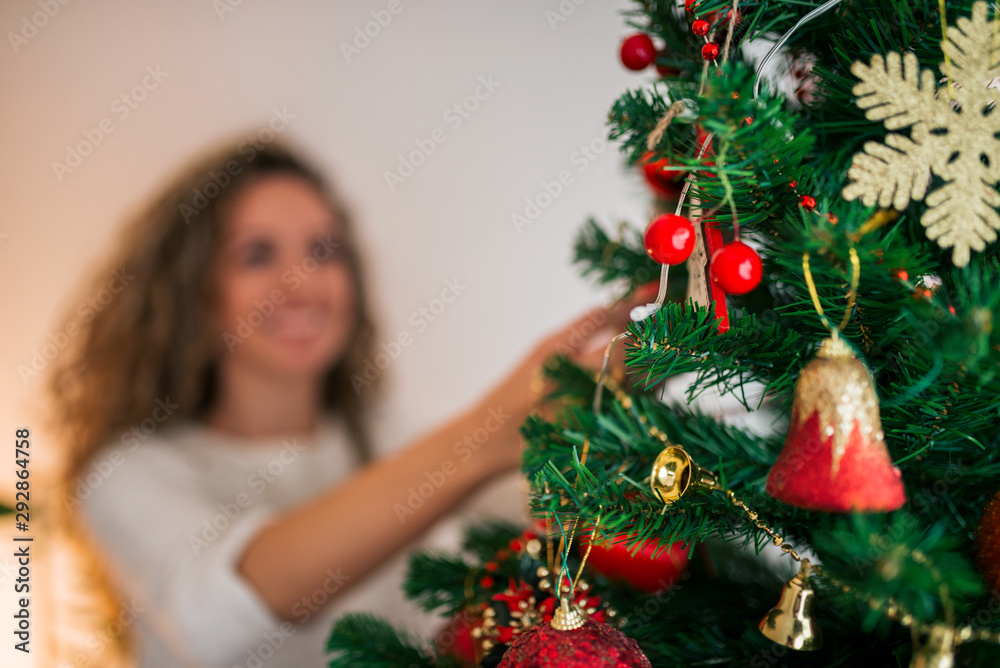 Christmas, decoration, holidays and people concept.