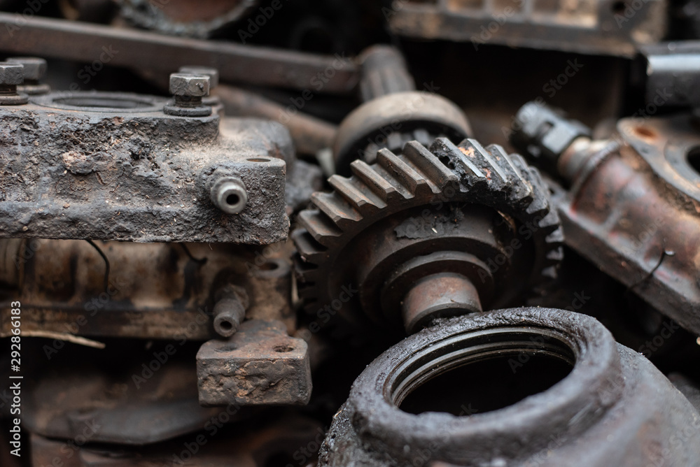 Old engine parts, steel and used car parts, for engineering. Selective focus. Old engine parts, steel and used car parts, for engineering. Selective focus.