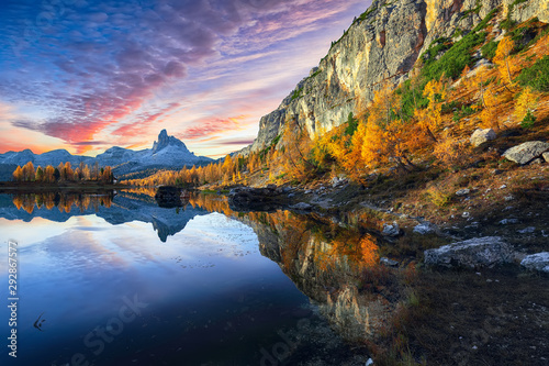 Wonderfull autumn view of Lake Federa in Dolomites at sunset