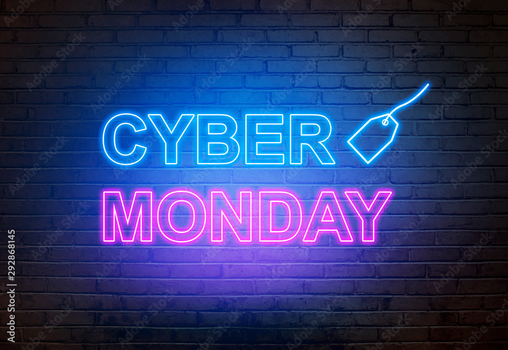 Cyber Monday text from an electric lamp on the wall - obrazy, fototapety, plakaty 
