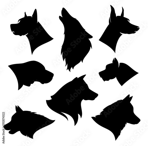 set of different dog breeds silhouettes - black and white vector outlines of profile pet heads