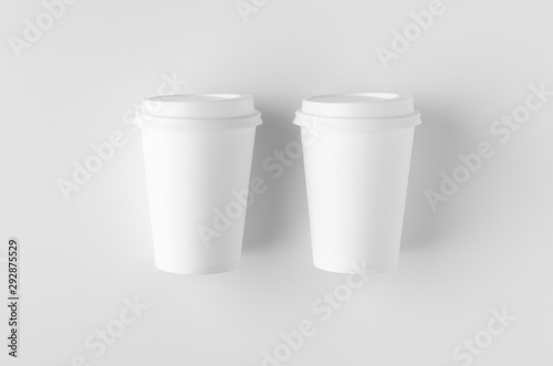 Top view of a 12 oz. white coffee paper cup mockup with lid.