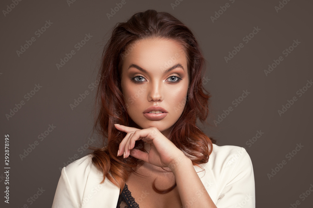 Fashion portrait of stylish woman in white jacket. Fashion portrait of stylish woman in white jacket.
