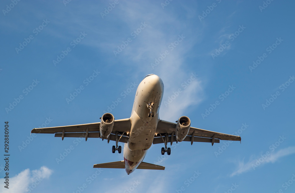 Commercial airliner against blue sky