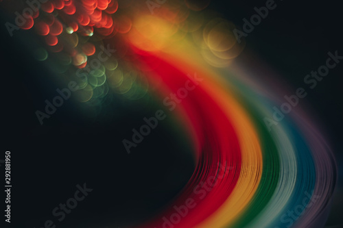 Tableau sur toile Beautiful abstract rainbow bridge and multi colored space background in the darkness
