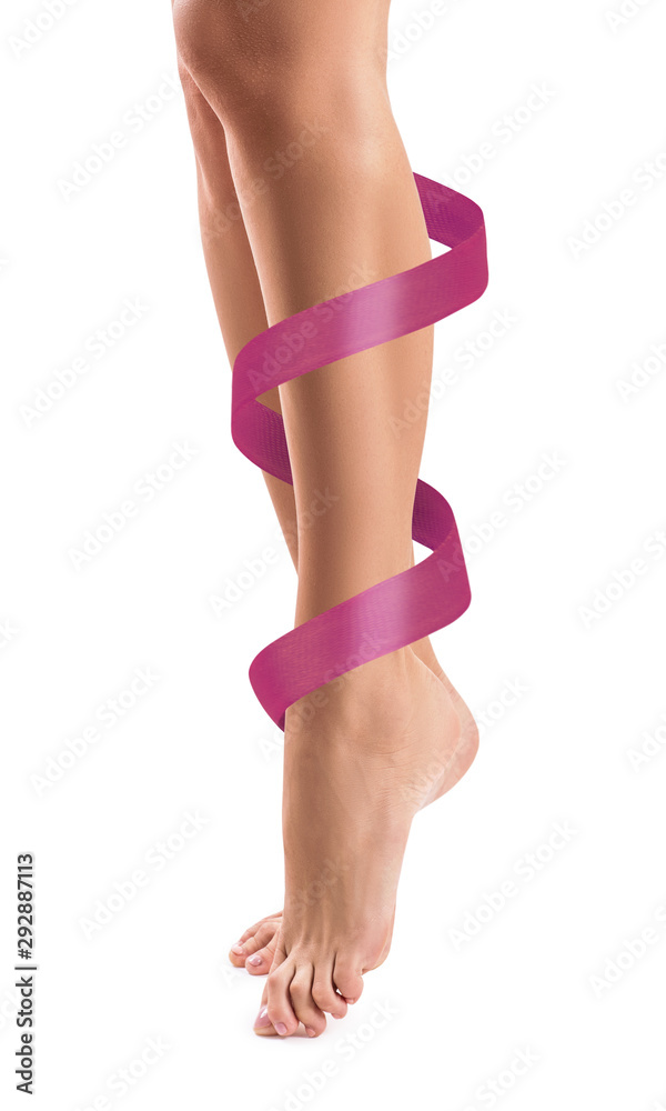 Women's legs with pink ribbon. Physical rehabilitation concept. - obrazy, fototapety, plakaty 