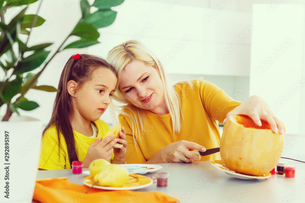 carved pumpkin for halloween lies on a table at home carved pumpkin for halloween lies on a table at home