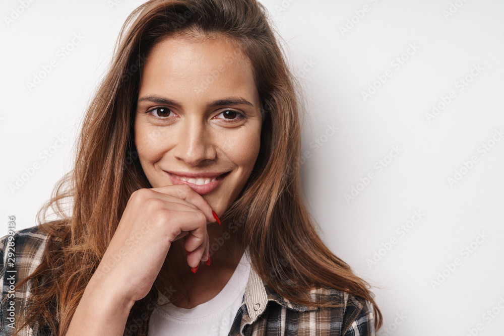 Close up of a young beautiful girl wearing plaid shirt Close up of a young beautiful girl wearing plaid shirt