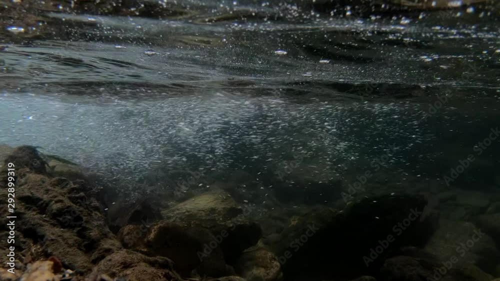 Zoom out slow motion underwater powerful stream Zoom out slow motion underwater powerful stream