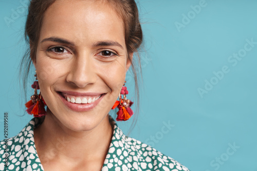 Close up portrait of a lovely young woman wearing shirt photo