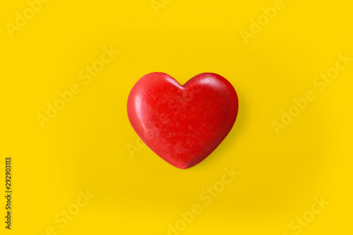 Hands holding  red heart, heart health, and donation concepts...