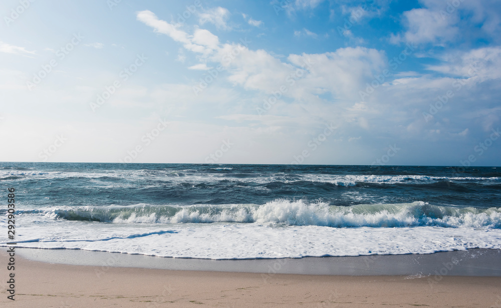 View of beach and clouds