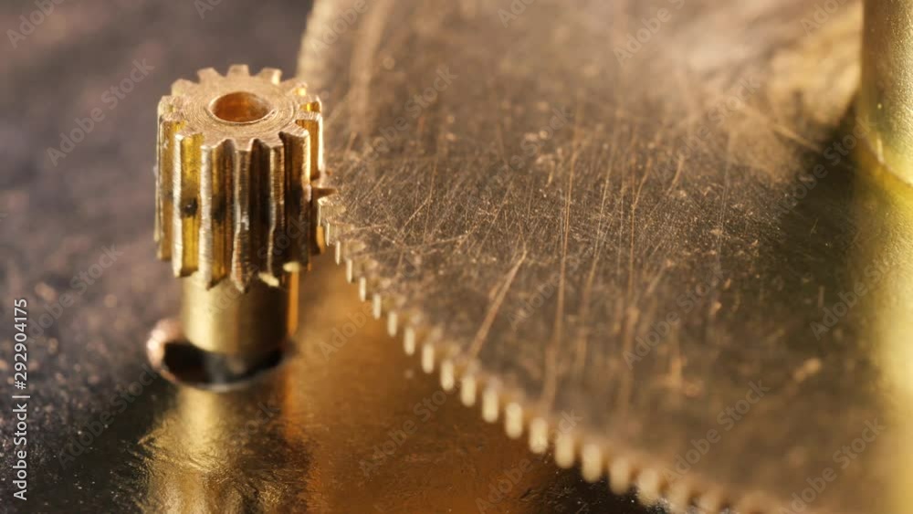 Cogwheel industrial gear mechanism at work, macro shot