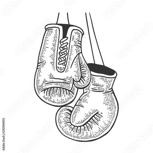 Boxing gloves sketch engraving vector illustration. Tee shirt apparel print design. Scratch board style imitation. Black and white hand drawn image.