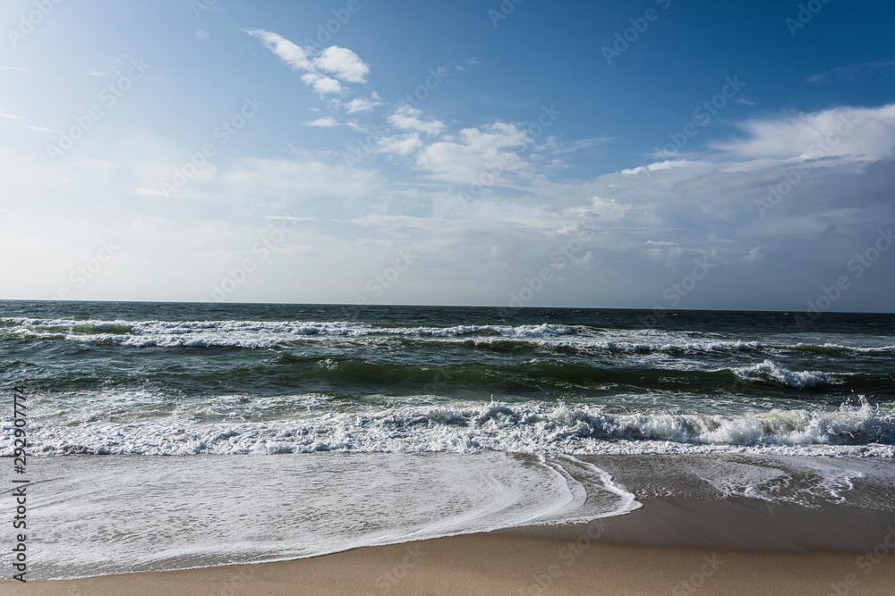 View of beach and clouds