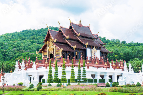 Closeup of Royal pavilion at Royal Park Rajapruek in Chiang Mai province,Thailand. Chiangmai Royal Pavilion ( Ho Kham Luang ) architecture with tree and blue sky background