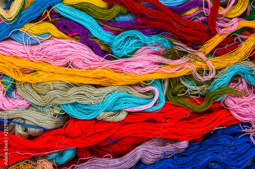 Colorful threads messy texture background. Mixed colorful thread tangle texture © phanasitti