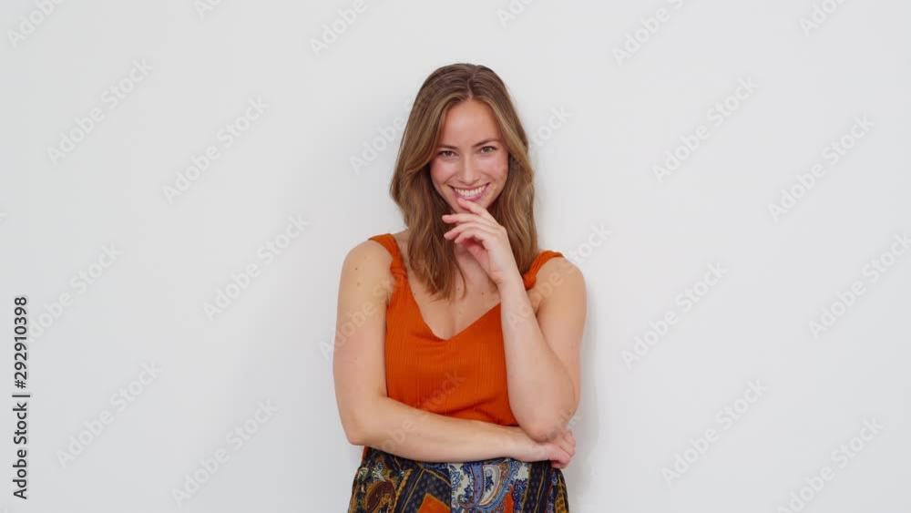 Half Body Shot of a Woman Seductively Playing with Her Brown Hair Half Body Shot of a Woman Seductively Playing with Her Brown Hair