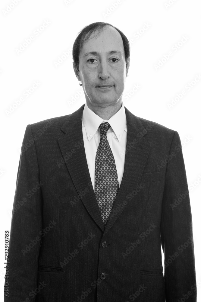 Portrait studio shot of mature man in black and white Portrait studio shot of mature man in black and white