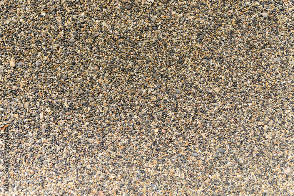background of colored pebbles and sand background of colored pebbles and sand