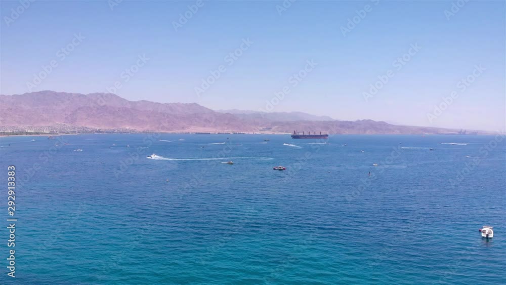 Large Tanker Ship in The red sea With small boats Aerial Drone footage over the red sea With Large Tanker Ship and speed boats Large Tanker Ship in The red sea With small boats Aerial Drone footage over the red sea With Large Tanker Ship and speed boats