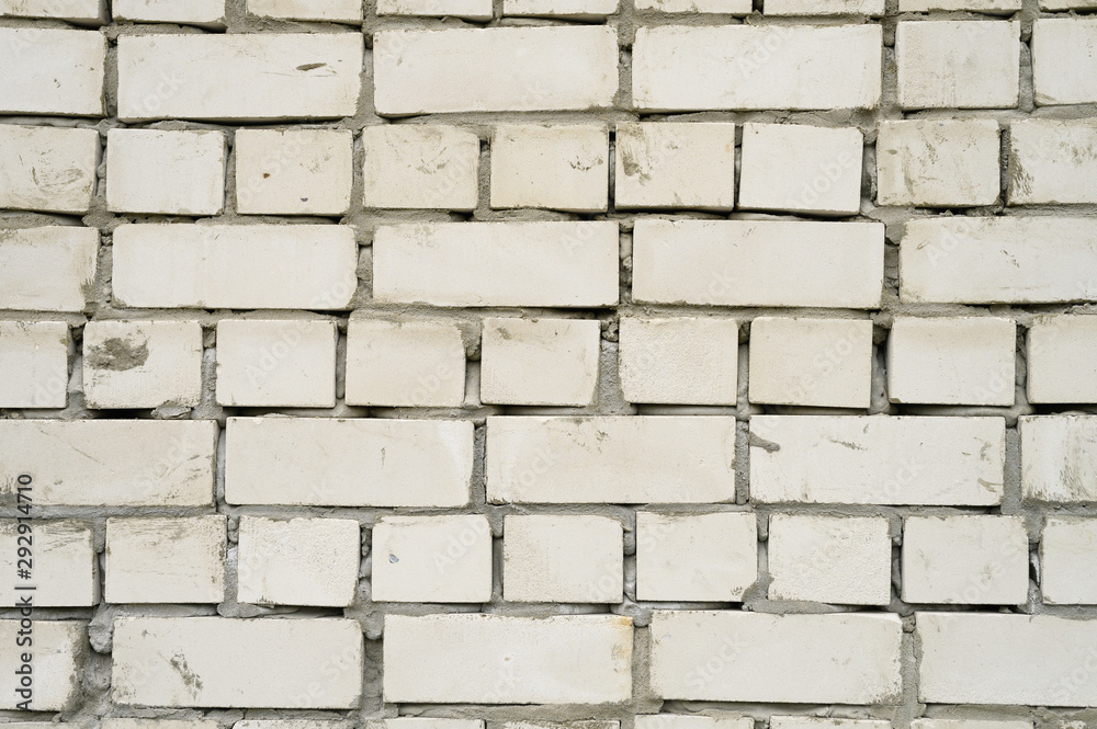 white brick blocks with cement