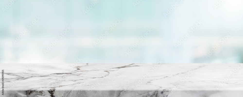 Empty white marble stone table top and blur glass window wall building banner mock up abstract background - can used for display or montage your products. - obrazy, fototapety, plakaty 