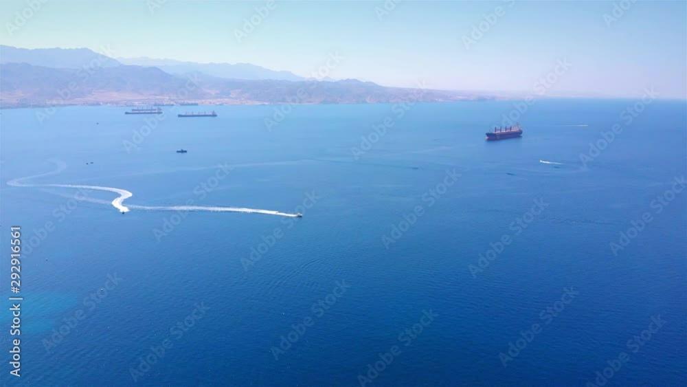Israel and Jordan Tanker ships in the red sea Aerial Drone footage over Israel and jordan red sea With Large Tanker Ships and speed boats Israel and Jordan Tanker ships in the red sea Aerial Drone footage over Israel and jordan red sea With Large Tanker Ships and speed boats