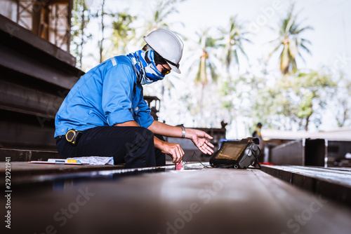 UT, Ultrasonic testing to detect imperfection or defect in welding of steel structure outside. NDT Inspection.